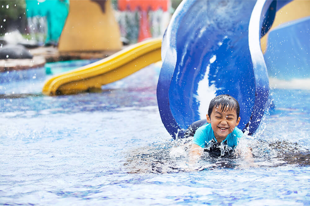 Children playing at water parks and water playgrounds in Singapore on World Water Day