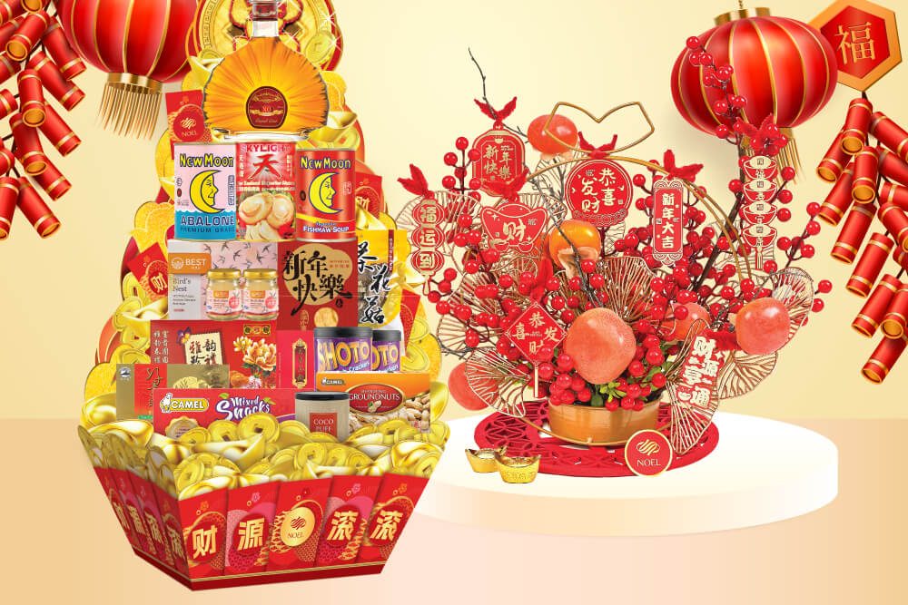 A Chinese New Year gift hamper packed with a bottle of brandy, american ginseng, abalone, cookies and chocolates. An artificial floral arrangement for Chinese New Year.